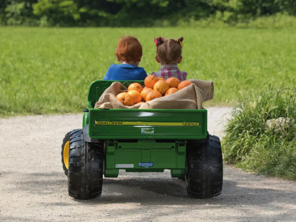 John Deere 12 volt elektrische kinder tractor met werkende graafarm en kantel bak duits engels frans vertaling