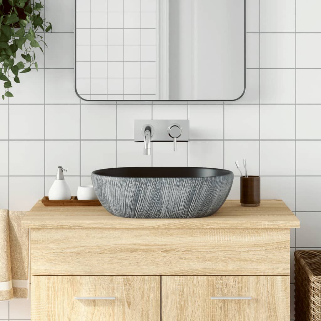 vidaXL Lavatório de bancada oval 47x33x13 cm cerâmica cinza e azul