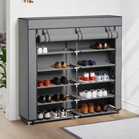 vidaXL Armário p/ sapatos com cobertura 115x28x110cm tecido preto