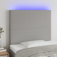 vidaXL Cabeceira de cama c/ luzes LED tecido 80x5x78/88 cm cinza-claro
