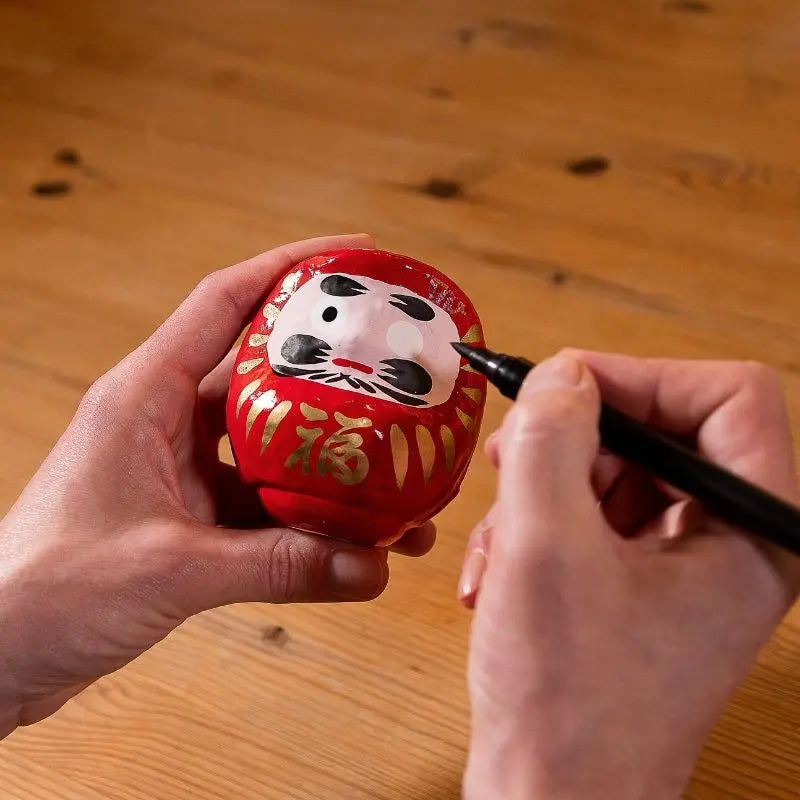 Daruma vermelho mini