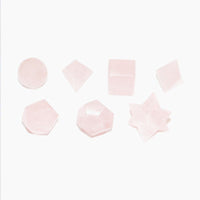 Conjunto de 7 sólidos platónicos de Quartzo Rosa com estojo em madeira