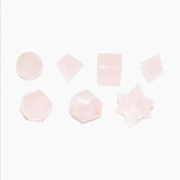 Conjunto de 7 sólidos platónicos de Quartzo Rosa com estojo em madeira